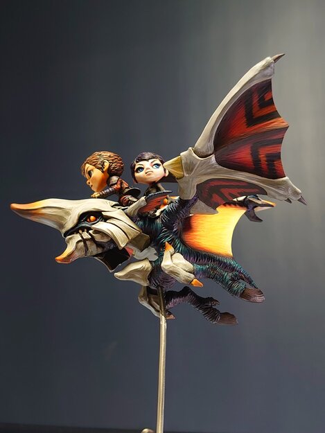 Azel and Edge Ride The Arm Wing Sculpture